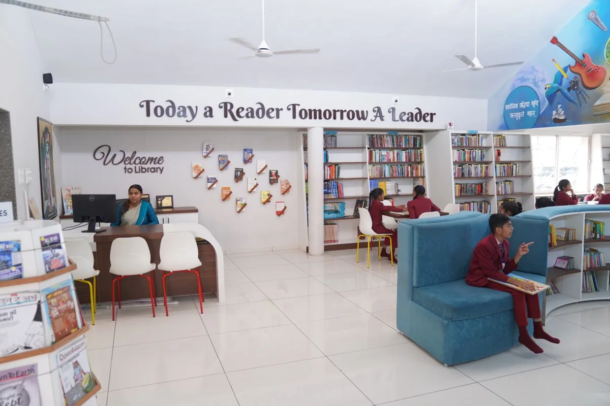 A bright library with students reading in Gujarat, India